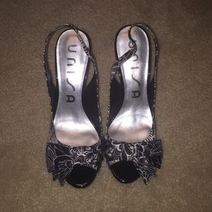 Black & White open toe sling back. Gently worn.